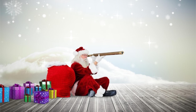 Santa looking through telescope against clouds on the horizon