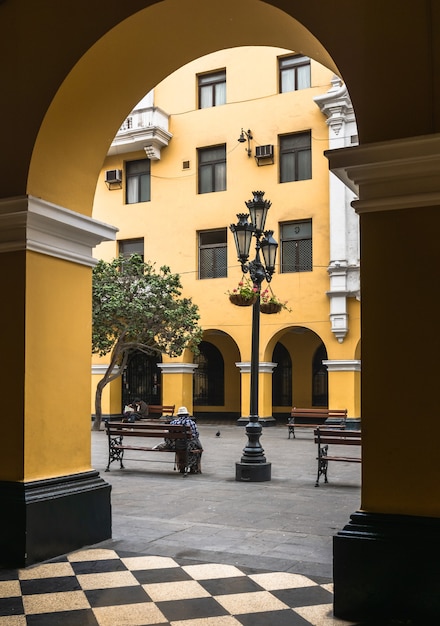 Santa Rosa passage in the historic center of Lima, path with colonial yellow buildings