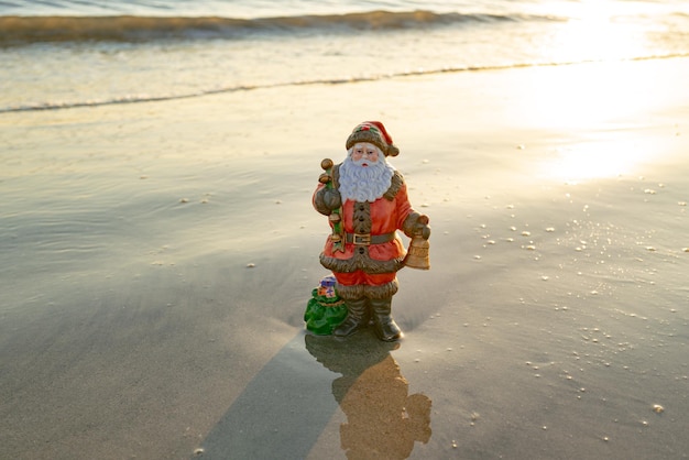 Santa on sea beach hot christmas and vacation