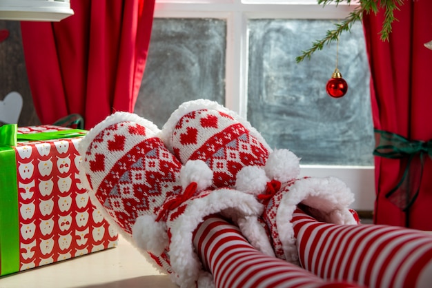 Photo santa woman legs, christmas scene