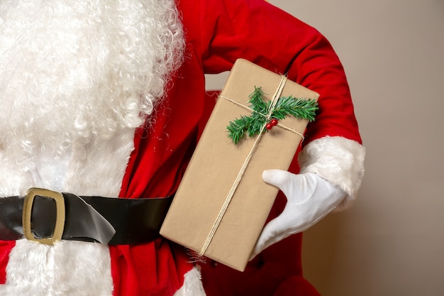 Santaclaus holding christmas gift