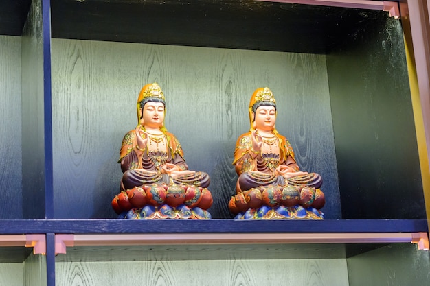 Sanya, Hainan, China - February 19, 2020: The Nanshan, Buddhist Cultural Park, Chinese souvenirs, crafts from jade, dolls, stones. Gift shop near of the statue of the goddess Guanyin.