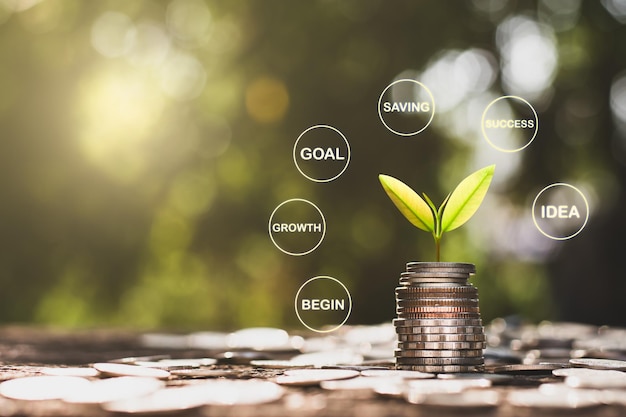 Photo saplings are growing on stacked coins with technology icons surrounding them