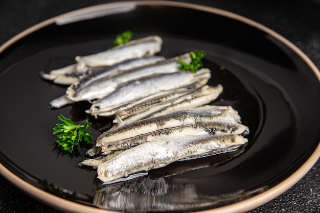 Sardines filet ansjovis zeevruchten gezonde maaltijd voedsel snack dieet op tafel kopieer ruimte voedsel