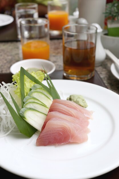 Sashimi of fresh tuna (Seafoods Sushi) on white dish.