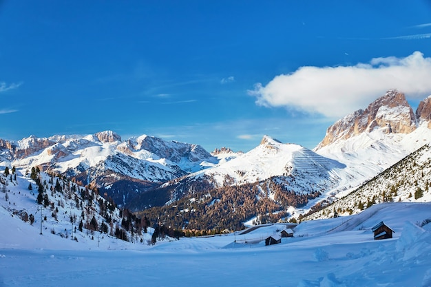 The Sassolungo Group massif covered in snow