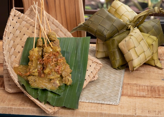 Sate Padang or satay padang is Spicy beef satay from Padang, West Sumatra. Served with spicy curry