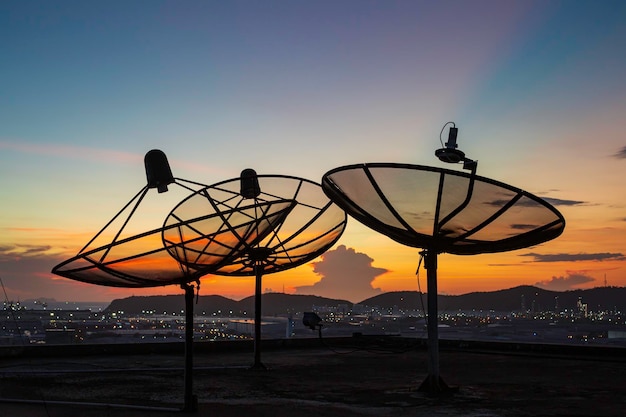 Satellite dish sky cloud sunset orange communication technology network