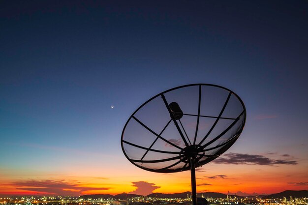 Satellite dish sky cloud sunset orange communication technology network