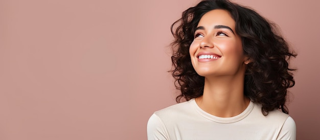 Satisfied Hispanic woman with a positive vibe showcasing an object on copy space