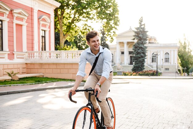 Satisfied young stylish man dressed in shirt