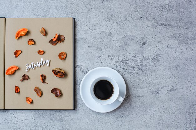 Saturday flat lay minimalist autumn concept with copy space