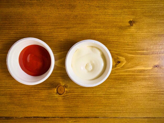 Sauce bowls mayonnaise and ketchup