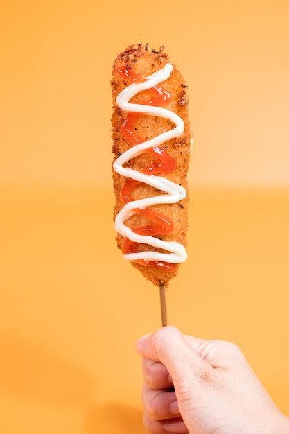 Photo sauced corn dog ready to eat