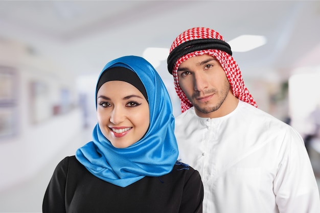 Saudi arab couple marriage looking with love isolate don a white background