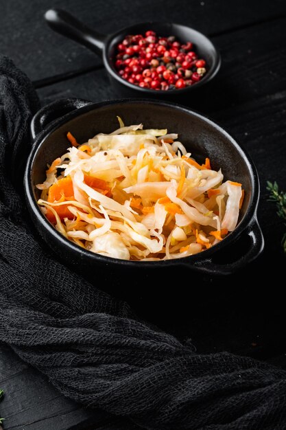 Sauerkraut preserving set, on black wooden table background