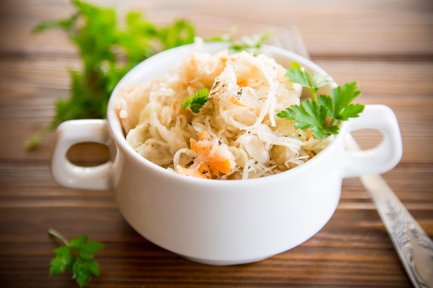 Sauerkraut with carrots and spices in a bowl