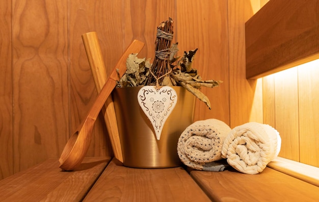 Sauna accessories for the celebration of Valentine's Day. Eucalyptus broom in the shape of a heart.