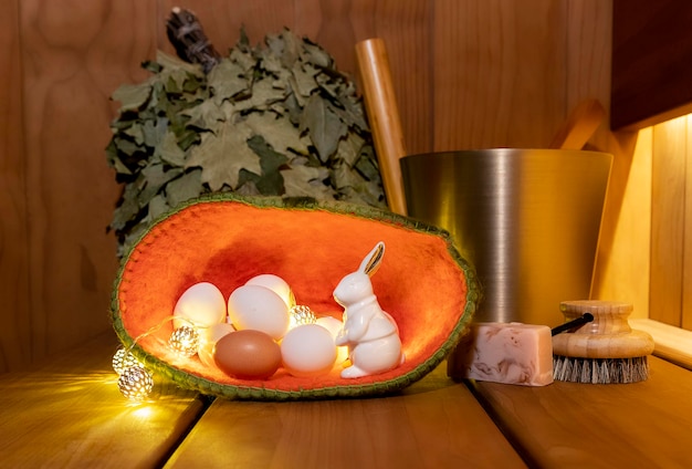 Sauna accessories and  Easter decor in the steam room. Spring  holiday vibes. Copy space