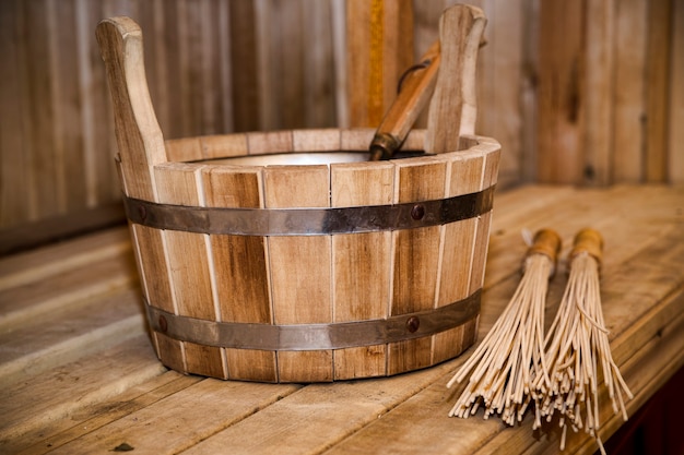 Фото Сауна, банные принадлежности. деревянное ведро и палки
