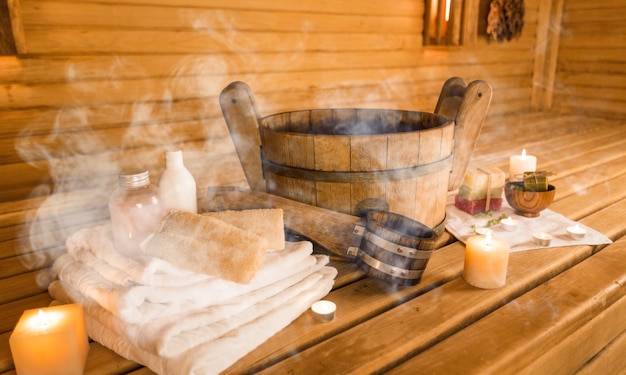 Sauna and sauna accessories on an interior background