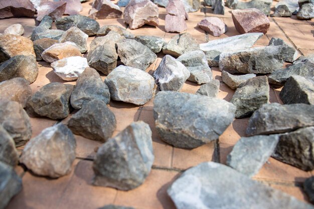 Sauna stones are on the tiles and dry