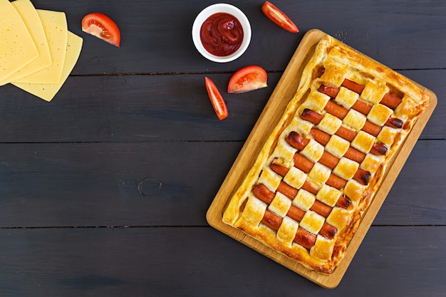 Sausage pie in puff pastry 