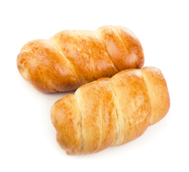 Sausage roll appetizing bun with sausage on a white background