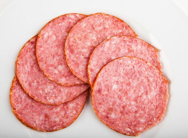 Photo sausage sliced sausage for pizza