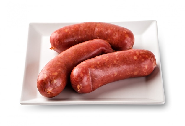 Sausages appetizing on a white plate