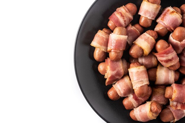 Sausages wrapped in smoked bacon