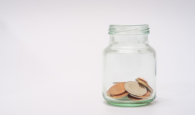 Save money and account banking for finance concept, Coins in bottle on white background