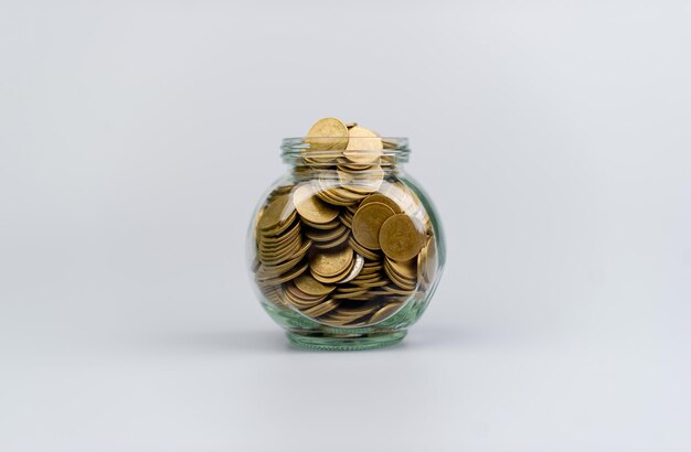 Saving money coin in glass jar investment income salary cash flow currency Financial savings set Financial Assets Inheritance Financial Growth and Investment