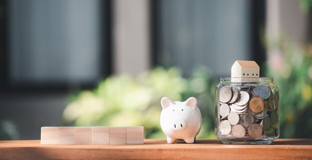 Photo saving money for house