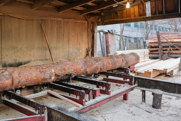 Sawmill the process of processing wood on the old sawmill\
equipment