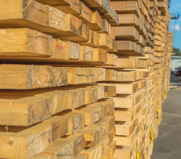 Sawmill. Warehouse of boards after sawing the outdoors.