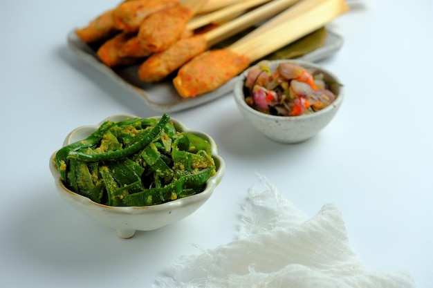 Sayur Bejek traditional food from Balinese Indonesia on white background Made from long bean