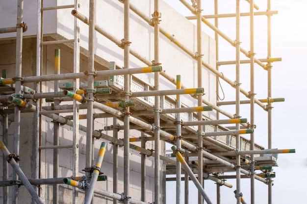 Scaffolding pipe clamp and parts,Construction site with scaffold tower and building