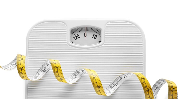 Photo scales and measuring tape isolated on white top view