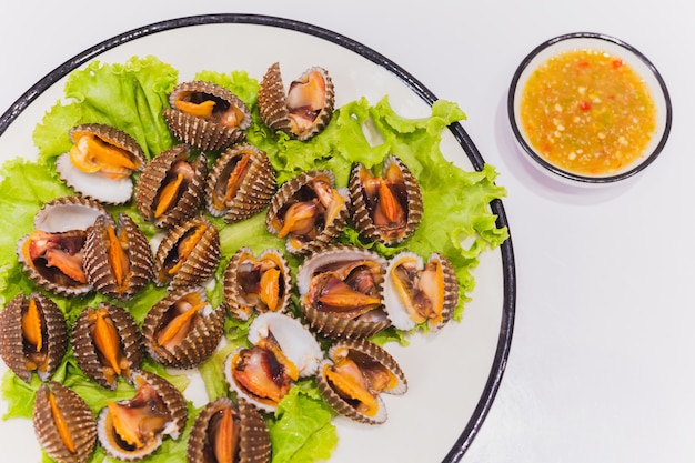 Soft-boiled Blood Cockles Shell Served with Spicy Sauce. Stock Photo ...