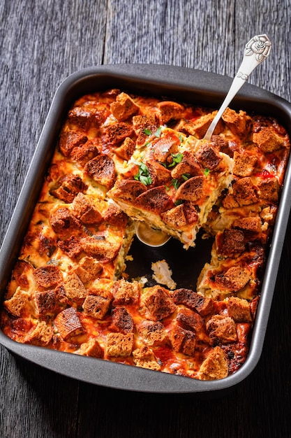 Photo scalloped chicken casserole topped with croutons