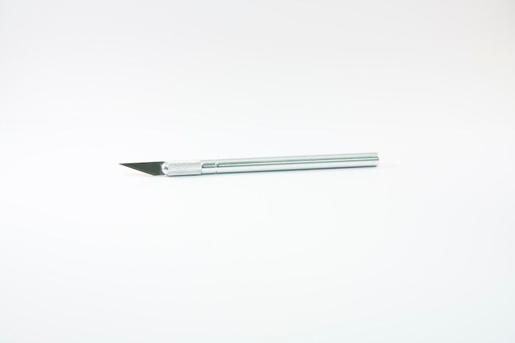 Photo scalpel against white background