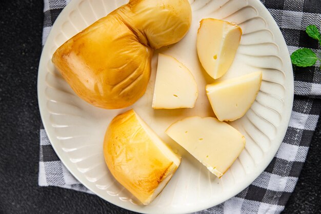 scamorza cheese smoked flavor healthy meal food snack on the table copy space food background