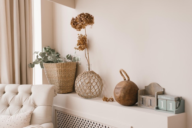 Scandinavian decor as a decoration in the house Dried hydrangea flowers in a vase