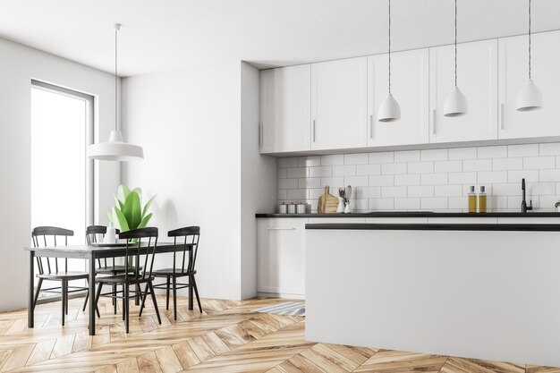 Photo scandinavian style kitchen corner with white walls, a wooden floor, white countertops and cabinets and a table with black chairs. 3d rendering mock up