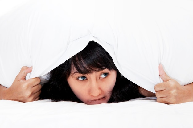 Scared Asian Woman Hiding