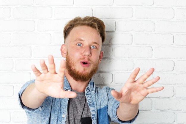 Scared and surprised man with beard