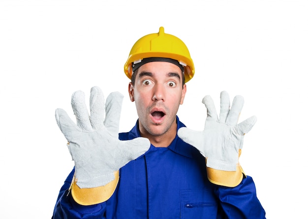Scared worker on white background