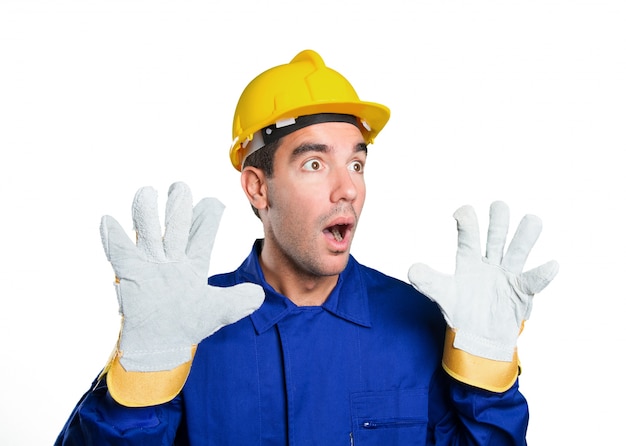 Scared worker on white background