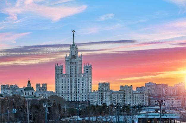 The scarlet clouds of autumn dawn over a high-rise on Kotelnicheskaya Embankment in Moscow